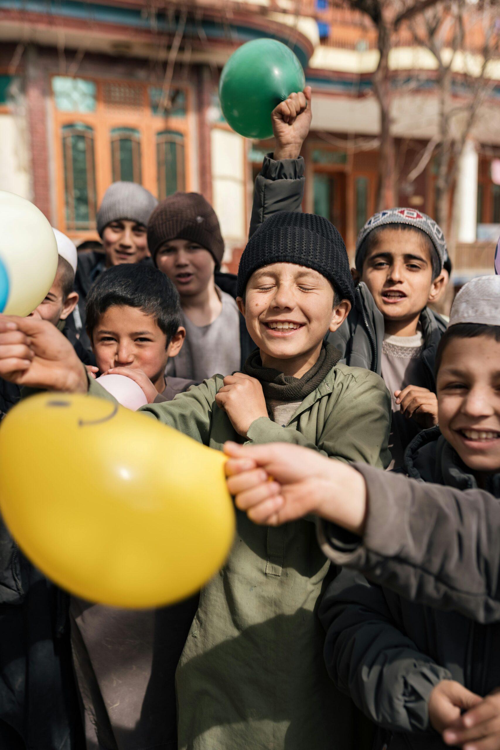 Children celebrating with balloons